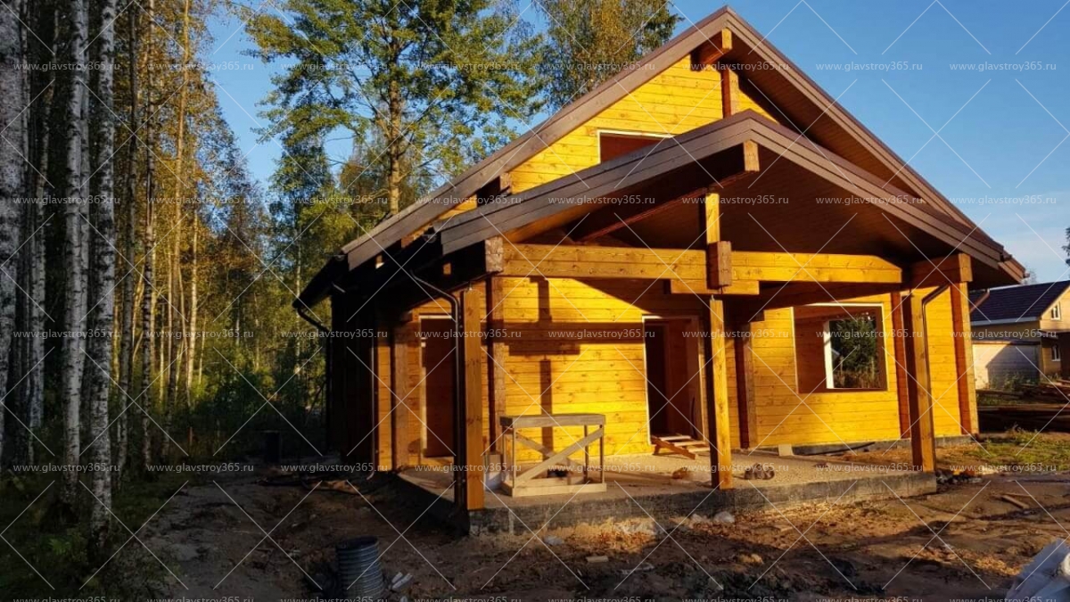 Дом из бруса с мансардой и большой крытой террасой в Ленинградской области